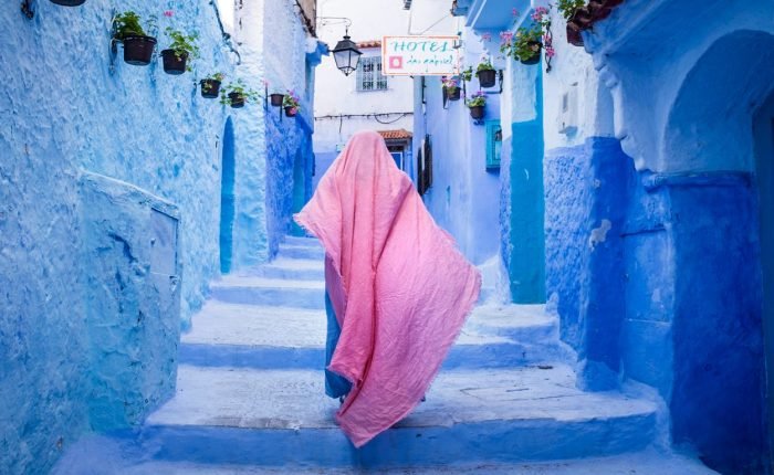 pink scarf woman on stairs